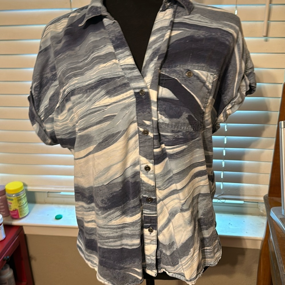 Blue and white shirt.